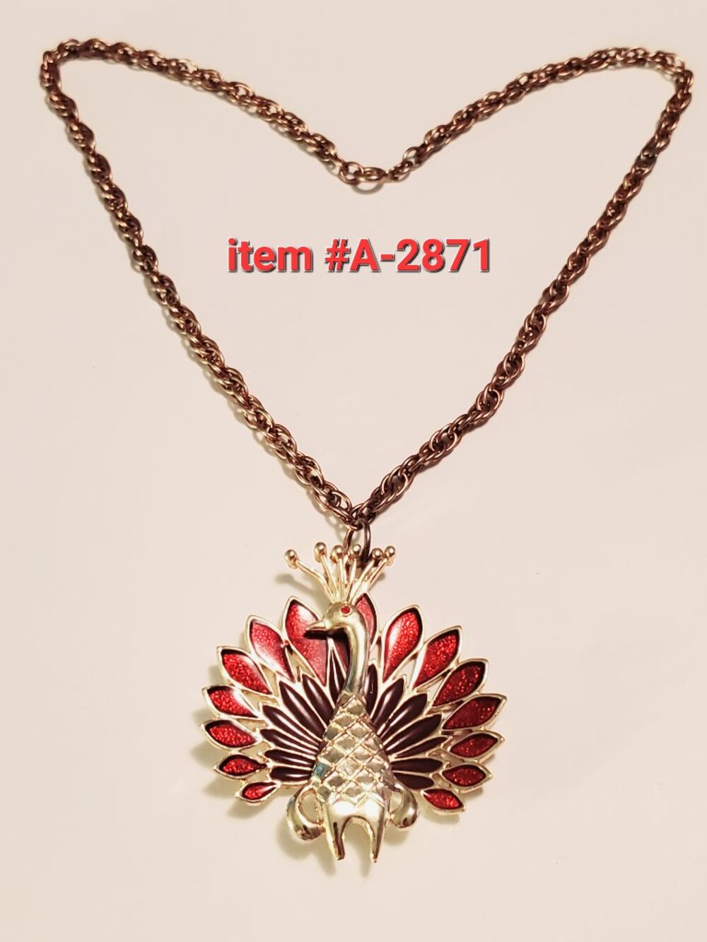 1 Peacock Necklace, item #A -2871,.  wt. 64 grams.